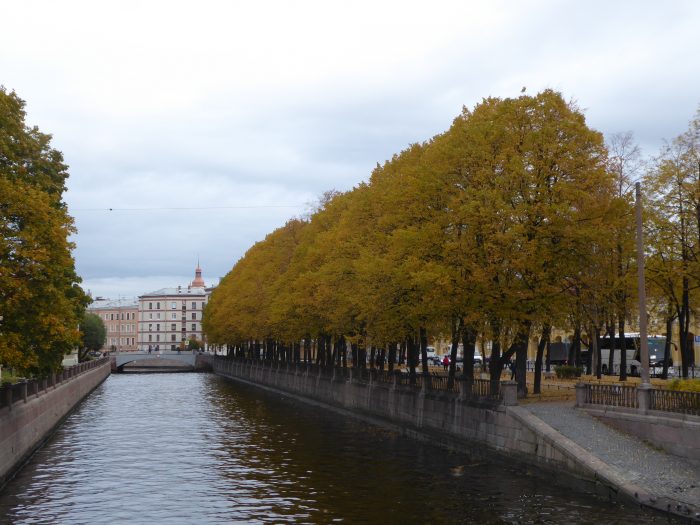 The tree-lined boulevard of Nikolskii Square running alongside the Griboedov Canal